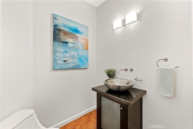 210 N Stage Coach Ln, Fallbrook, CA 92028 - bathroom with wood finished floors and vanity