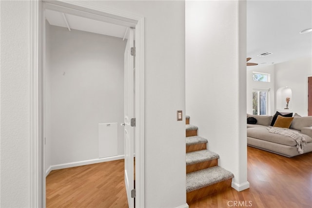 210 N Stage Coach Ln, Fallbrook, CA 92028 - stairway featuring wood finished floors and baseboards