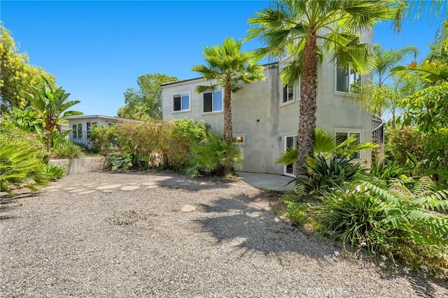 210 N Stage Coach Ln, Fallbrook, CA 92028 - back of house featuring stucco siding