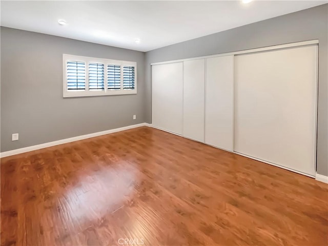 14560 Clark St Unit 202, Sherman Oaks, CA 91411 - unfurnished bedroom featuring wood finished floors, a closet, and recessed lighting