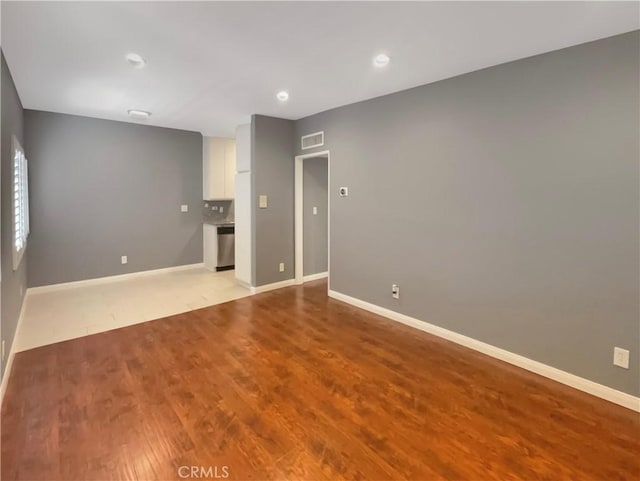 14560 Clark St Unit 202, Sherman Oaks, CA 91411 - spare room featuring light wood finished floors and recessed lighting