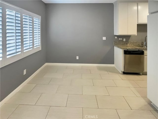 14560 Clark St Unit 202, Sherman Oaks, CA 91411 - kitchen with stainless steel dishwasher, white cabinetry, and stone countertops