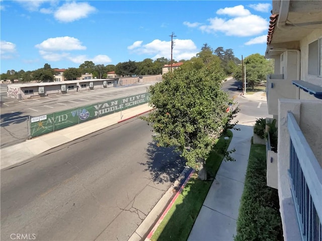 14560 Clark St Unit 202, Sherman Oaks, CA 91411 - view of asphalt road featuring curbs and sidewalks