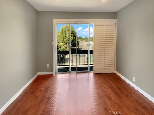 14560 Clark St Unit 202, Sherman Oaks, CA 91411 - unfurnished room featuring baseboards and wood finished floors