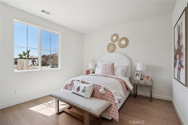 38840 Malva Rosa Dr, Palmdale, CA 93551 - bedroom featuring wood finished floors and baseboards
