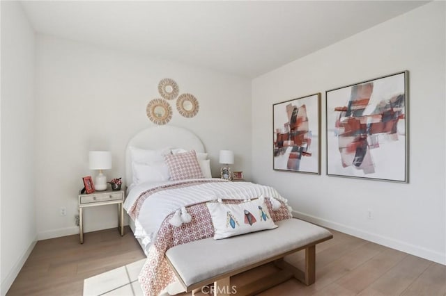 38840 Malva Rosa Dr, Palmdale, CA 93551 - bedroom with light wood-style flooring