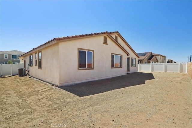 38840 Malva Rosa Dr, Palmdale, CA 93551 - rear view of property featuring a fenced backyard, a tile roof, and stucco siding
