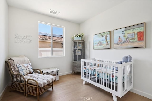 38840 Malva Rosa Dr, Palmdale, CA 93551 - bedroom featuring baseboards and light wood-type flooring