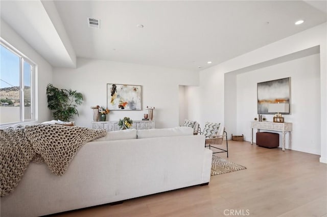 38840 Malva Rosa Dr, Palmdale, CA 93551 - living room featuring light wood finished floors and recessed lighting