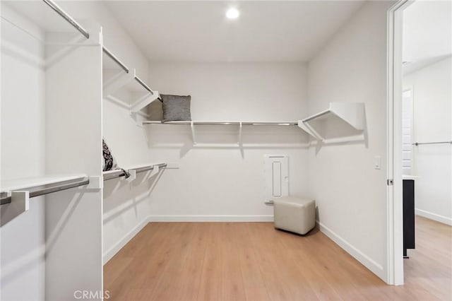 38840 Malva Rosa Dr, Palmdale, CA 93551 - walk in closet featuring light wood-style floors