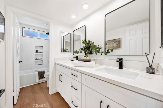 26592 Tampico Pl, Mission Viejo, CA 92691 - full bath featuring double vanity, wood finished floors, bathing tub / shower combination, and recessed lighting