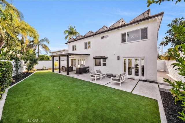 26592 Tampico Pl, Mission Viejo, CA 92691 - rear view of property featuring french doors, outdoor lounge area, a fenced backyard, stucco siding, and a patio area