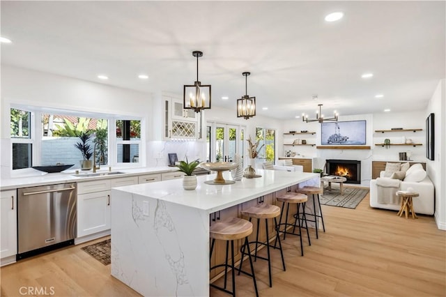26592 Tampico Pl, Mission Viejo, CA 92691 - kitchen featuring dishwasher, a chandelier, white cabinetry, and recessed lighting