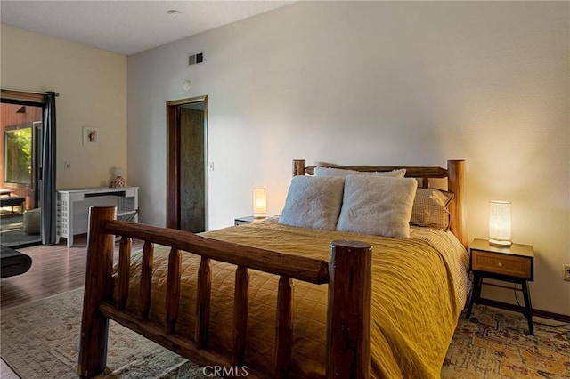 161 Pine Ridge Rd, Crestline, CA 92325 - bedroom with wood finished floors and access to exterior