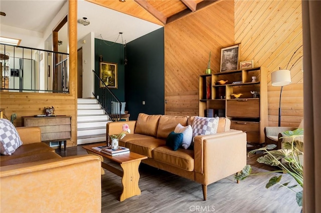 161 Pine Ridge Rd, Crestline, CA 92325 - living room featuring wood walls, stairway, and wood finished floors