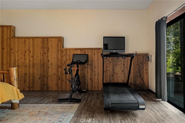 161 Pine Ridge Rd, Crestline, CA 92325 - workout room with wood finished floors and wood walls