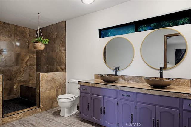 161 Pine Ridge Rd, Crestline, CA 92325 - full bath featuring double vanity, wood finished floors, and walk in shower