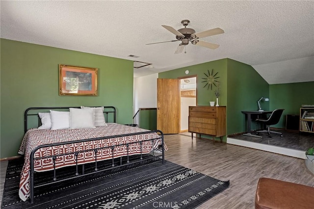 161 Pine Ridge Rd, Crestline, CA 92325 - bedroom with wood finished floors, a textured ceiling, and a ceiling fan