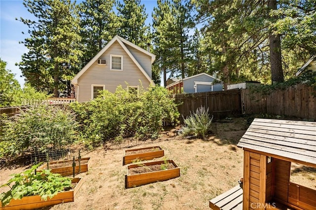 161 Pine Ridge Rd, Crestline, CA 92325 - fenced backyard with a vegetable garden