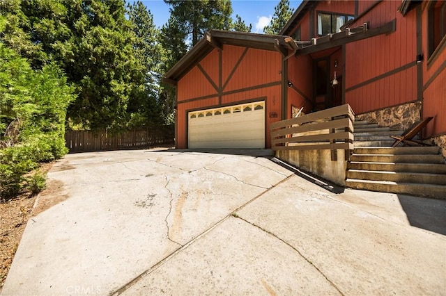 161 Pine Ridge Rd, Crestline, CA 92325 - view of property exterior featuring driveway and an attached garage