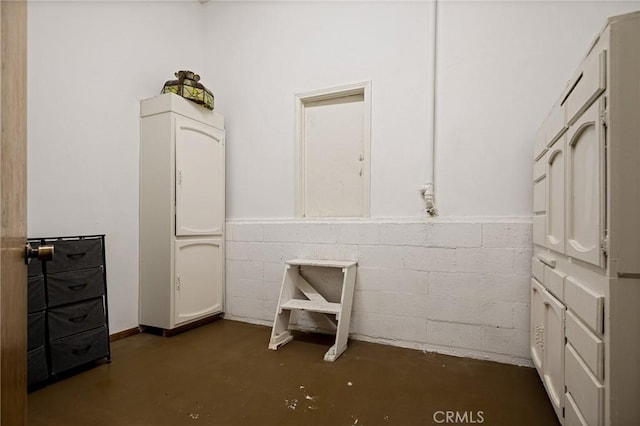 161 Pine Ridge Rd, Crestline, CA 92325 - unfurnished bedroom with concrete flooring and concrete block wall