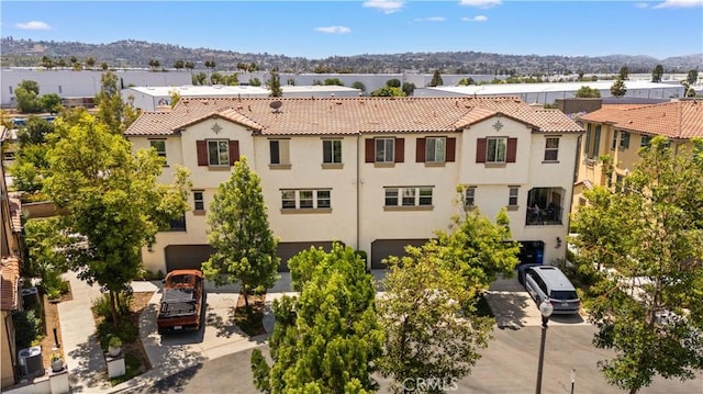 20916 Jade Dr, Walnut, CA 91789 - view of property with a garage, concrete driveway, and a residential view