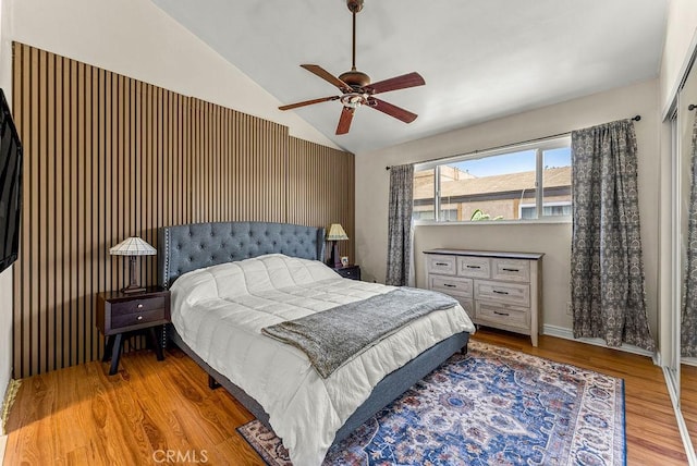 1745 Neil Armstrong Ave Unit 104, Montebello, CA 90640 - bedroom with vaulted ceiling, wood finished floors, and ceiling fan
