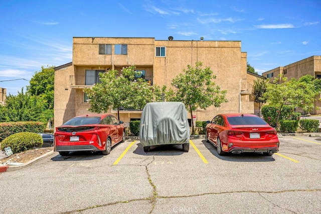 1745 Neil Armstrong Ave Unit 104, Montebello, CA 90640 - view of property with uncovered parking