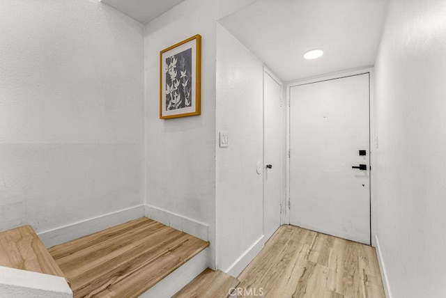 1745 Neil Armstrong Ave Unit 104, Montebello, CA 90640 - entrance foyer with wood finished floors and baseboards