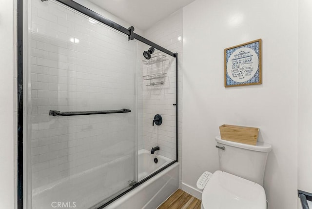 1745 Neil Armstrong Ave Unit 104, Montebello, CA 90640 - bathroom with enclosed tub / shower combo and wood finished floors