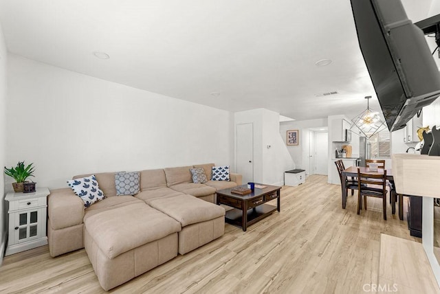 1745 Neil Armstrong Ave Unit 104, Montebello, CA 90640 - living room with light wood-style flooring