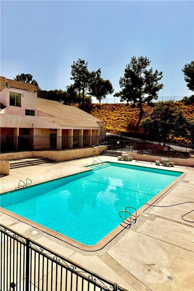 1745 Neil Armstrong Ave Unit 104, Montebello, CA 90640 - community pool with a patio area