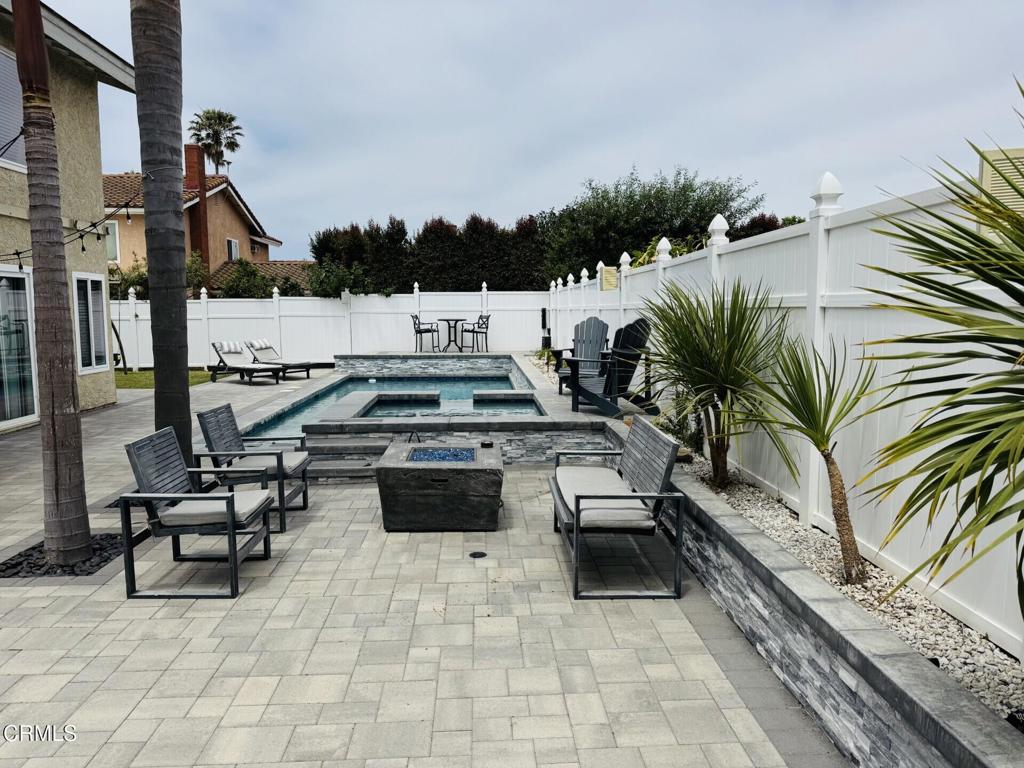 2801 Ivanhoe Ave, Oxnard, CA 93030 - fenced backyard featuring a patio and an in-ground hot tub