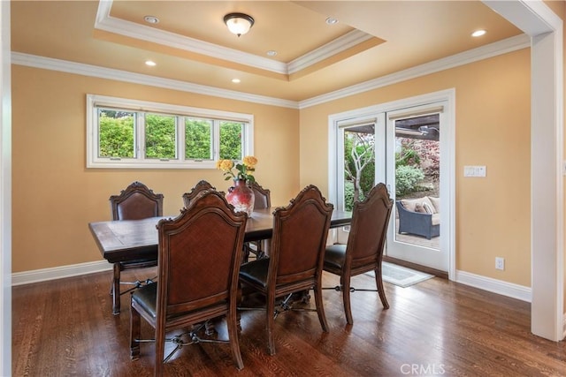 869 Rincon Ln, Palos Verdes Estates, CA 90274 - dining area featuring healthy amount of natural light, dark wood-type flooring, a raised ceiling, and ornamental molding