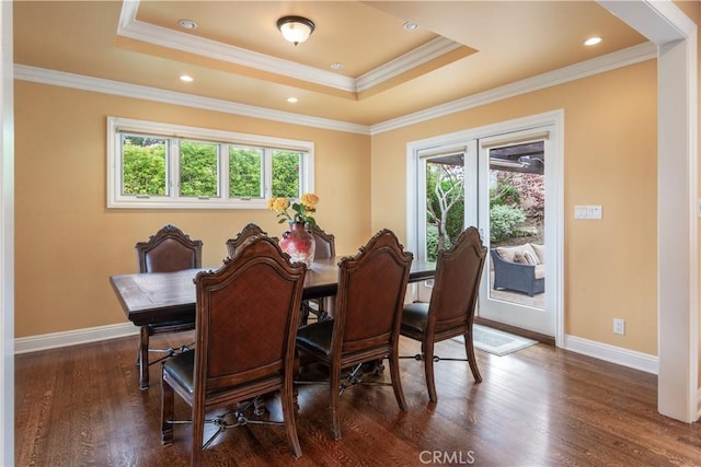 869 Rincon Ln, Palos Verdes Estates, CA 90274 - dining space featuring healthy amount of natural light, dark wood-style flooring, a raised ceiling, and crown molding