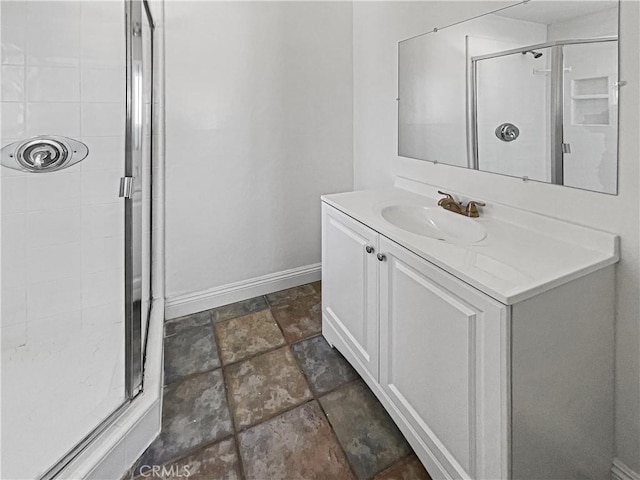 8800 Cedros Ave Unit 209, Panorama City, CA 91402 - full bathroom featuring a shower stall, stone finish flooring, and vanity