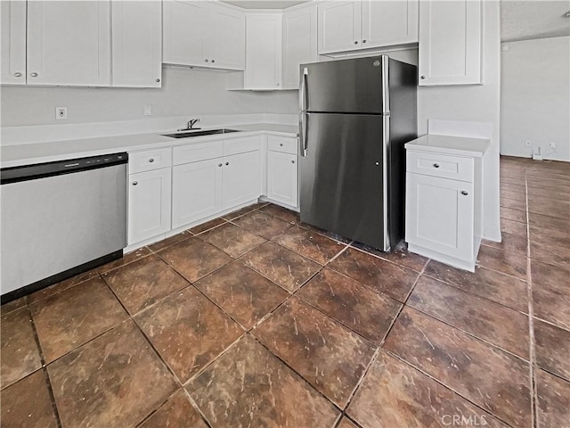 8800 Cedros Ave Unit 209, Panorama City, CA 91402 - kitchen featuring appliances with stainless steel finishes, white cabinets, and light countertops
