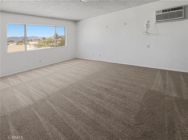 8800 Cedros Ave Unit 209, Panorama City, CA 91402 - empty room with a textured ceiling and carpet flooring