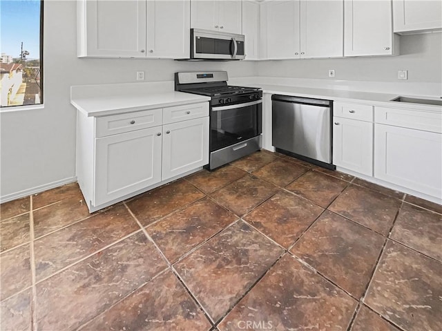 8800 Cedros Ave Unit 209, Panorama City, CA 91402 - kitchen featuring appliances with stainless steel finishes and white cabinetry