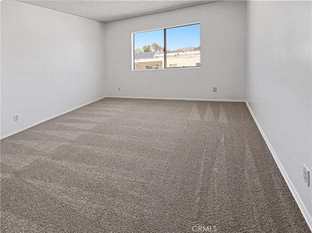 8800 Cedros Ave Unit 209, Panorama City, CA 91402 - spare room with a textured ceiling and carpet flooring