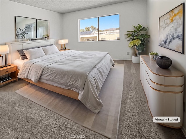 8800 Cedros Ave Unit 209, Panorama City, CA 91402 - bedroom featuring carpet floors and a textured ceiling