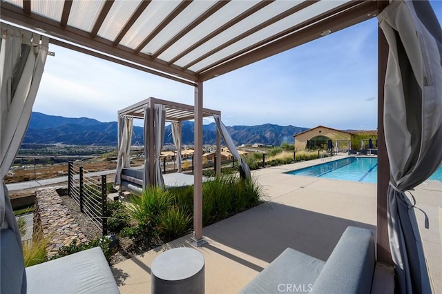 11537 Alton Dr, Corona, CA 92883 - view of patio featuring a mountain view and an outdoor pool