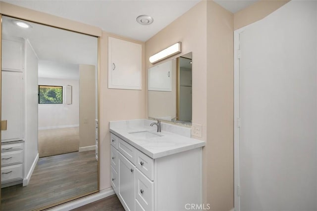 905 Ronda Sevilla Unit 0, Laguna Woods, CA 92637 - bathroom featuring vanity and wood finished floors