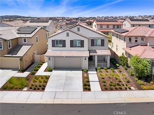 32210 Hillstone St, Temecula, CA 92591 - view of front facade featuring a residential view, concrete driveway, a garage, and stucco siding