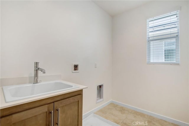 32210 Hillstone St, Temecula, CA 92591 - laundry area with cabinet space and washer hookup