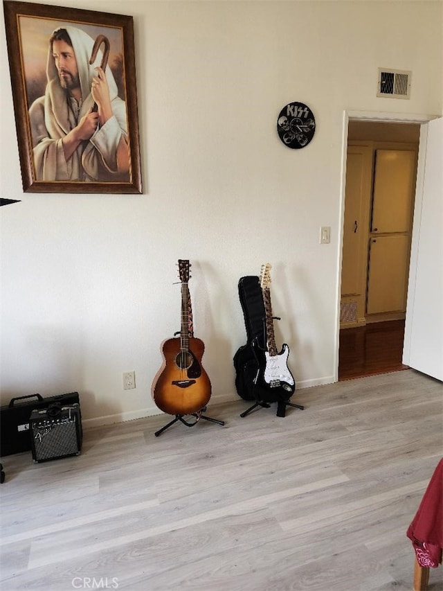 15116 S Raymond Ave Unit 104, Gardena, CA 90247 - sitting room with wood finished floors and baseboards