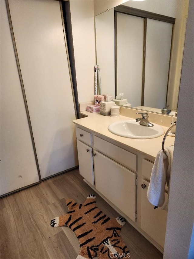 15116 S Raymond Ave Unit 104, Gardena, CA 90247 - bathroom with wood finished floors and vanity