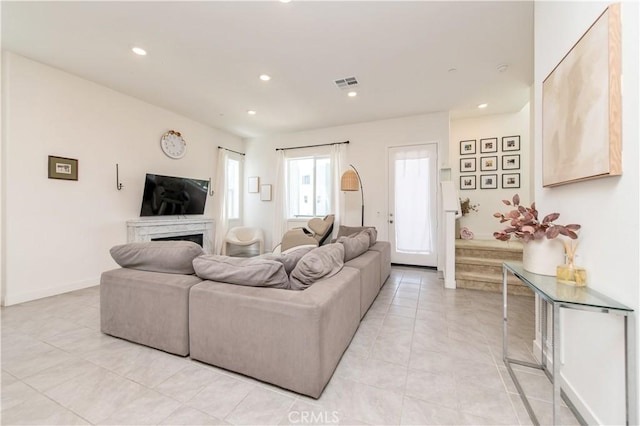 251 Sash, Irvine, CA 92618 - living room featuring recessed lighting, light tile patterned floors, and a premium fireplace