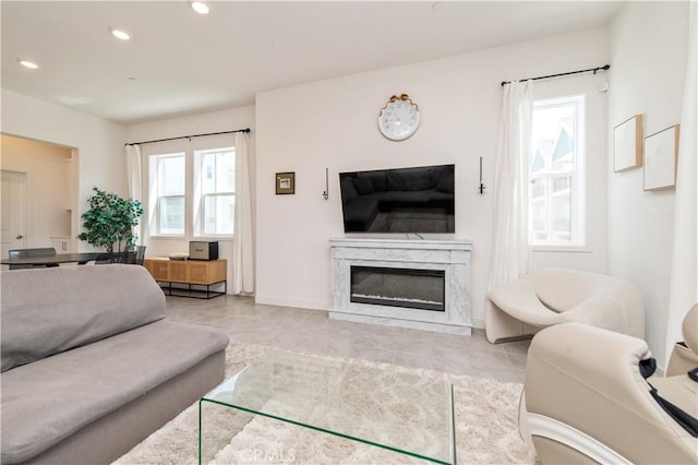 251 Sash, Irvine, CA 92618 - living area with plenty of natural light, recessed lighting, and a high end fireplace