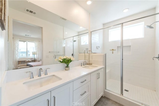 251 Sash, Irvine, CA 92618 - bathroom with a shower stall, healthy amount of natural light, connected bathroom, double vanity, and recessed lighting